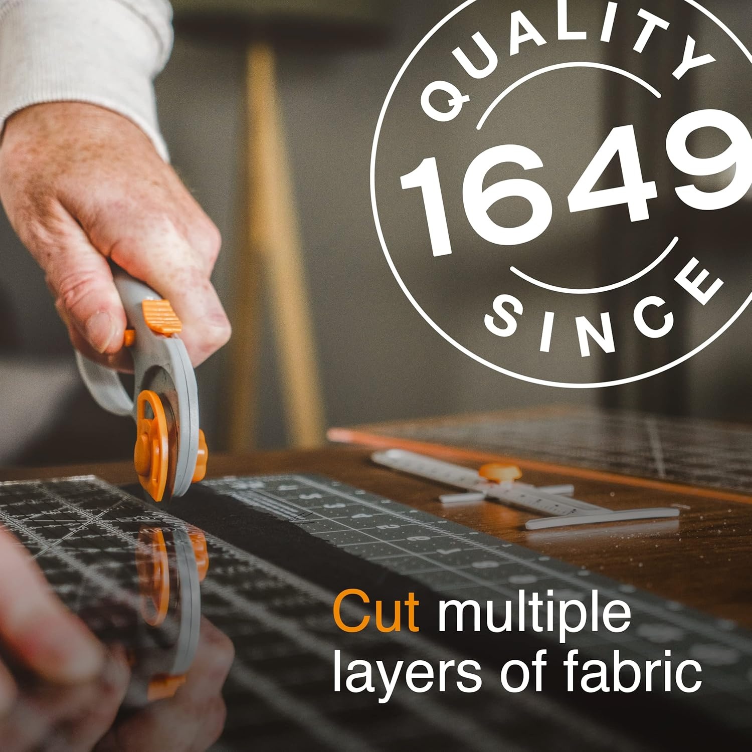Fiskars Classic 45mm Loop Rotary Cutter for Fabric and Paper – 45mm – Rotary Cutter for Sewing, Arts and Crafts with Comfort Handle – Grey and Orange [packing may slightly vary]